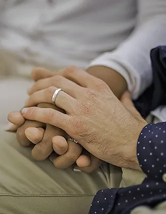 two people holding hands